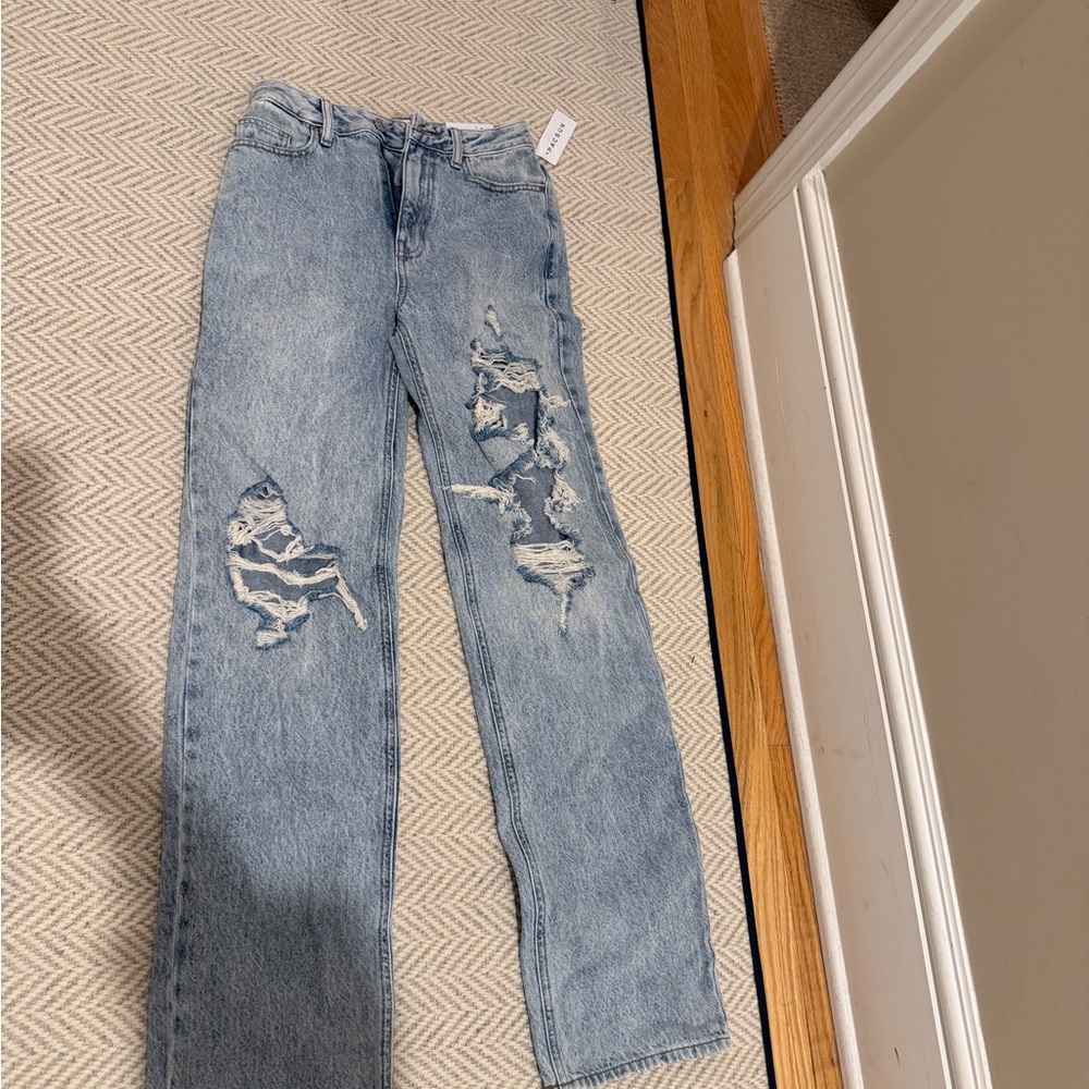 Distressed Blue Jeans